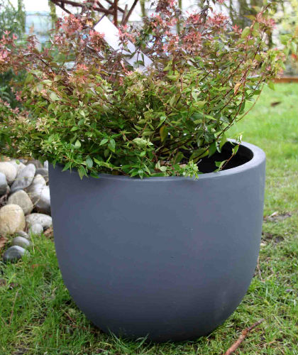 Design paysage maçonnerie minéral écologique terrasse bois ipé exotique bac pot jardinière fontaine acier rouillé inox caillebotis pergola bassin végétaux galet rocher déco clôture palissade éclairage