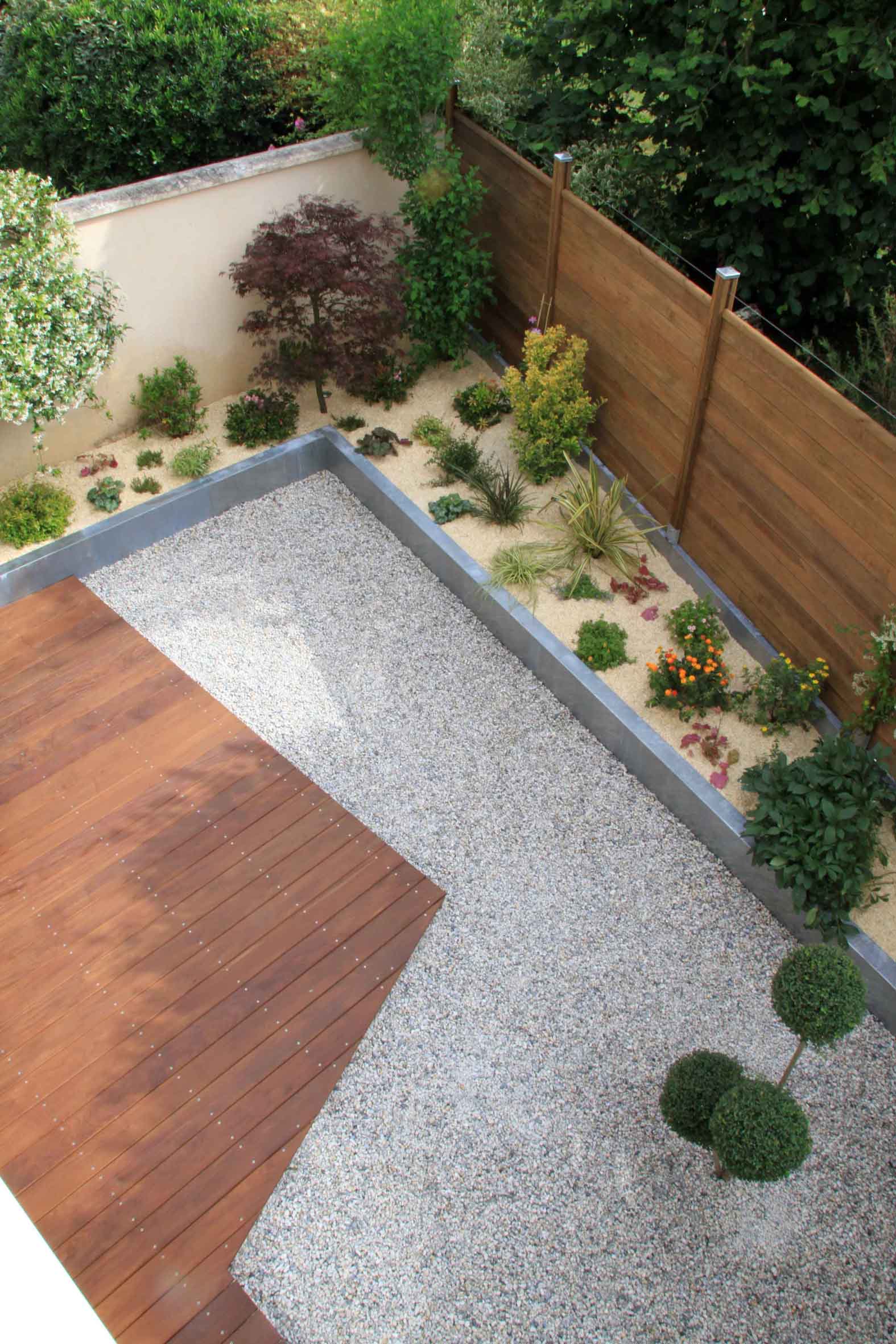 Construction maçonnerie paysagère moderne contemporain minéral minéraux japonais rivière sèche écologique éco responsable méditerranéen massif terrasse bois ipé pin autoclave exotique sapin mobilier bac pot jardinière fontaine gazon acier rouillé métaux inox zinc caillebotis pergola bassin plantation végétaux gravier galet rocher déco paillage cadre végétal clôture palissade câble éclairage électricité haie paysagère gravier câble grimpante